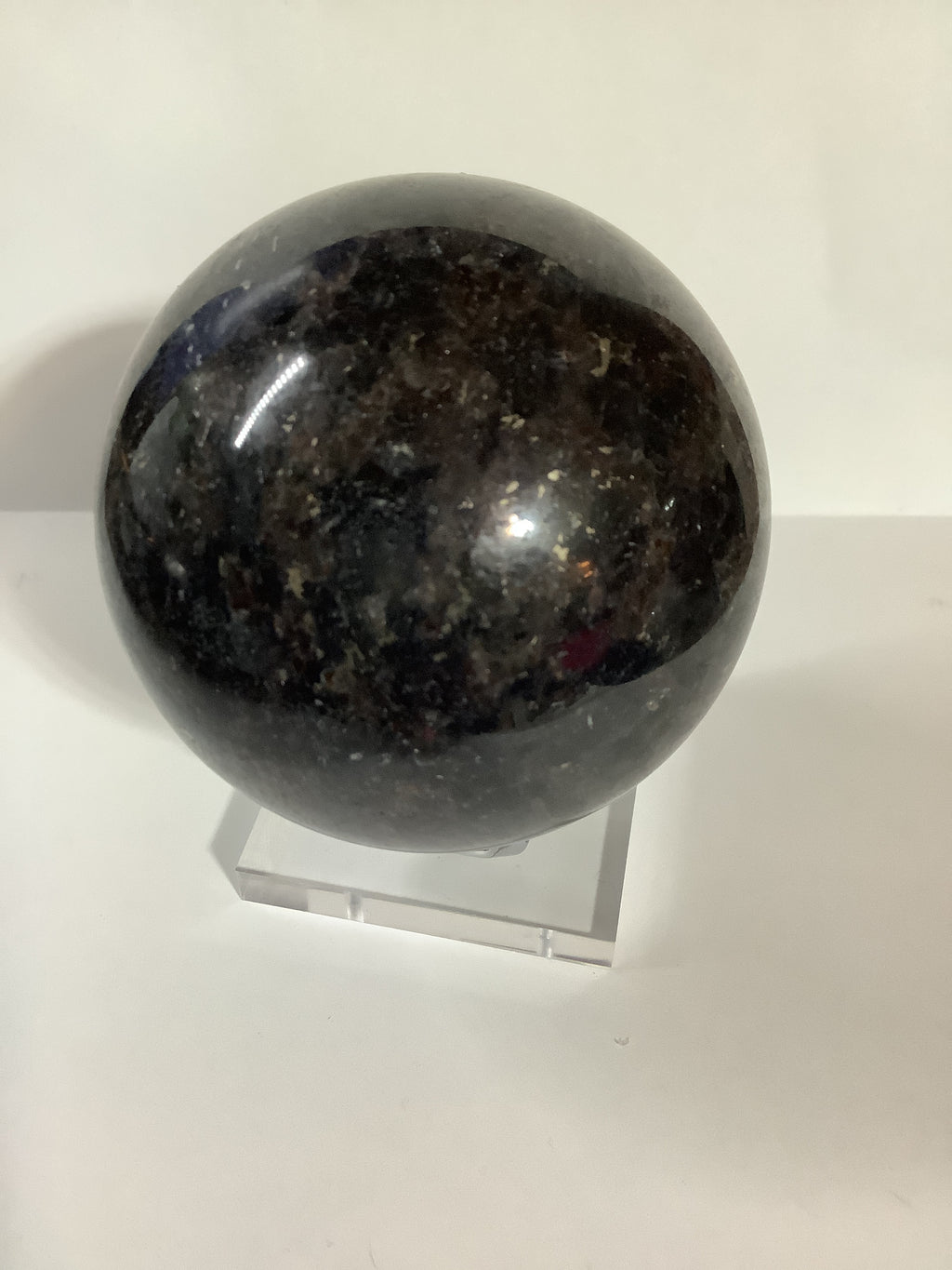 Astrophyllite and Garnet Sphere - Fireworks Stone with Blue and Silver Flashes