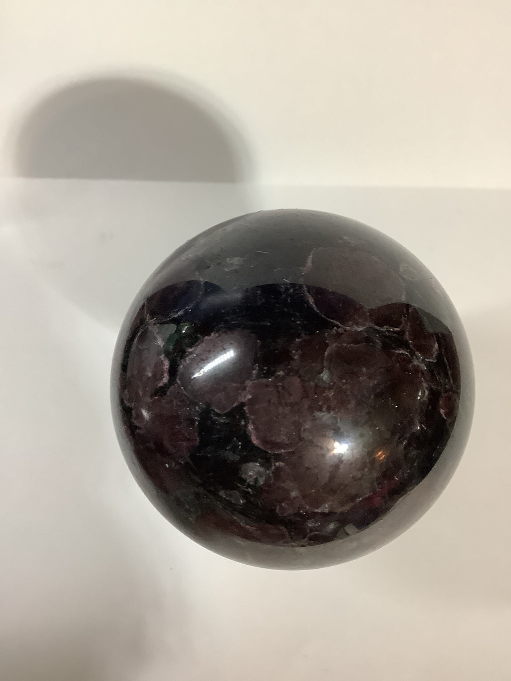 Astrophyllite and Garnet Sphere with Large Garnets