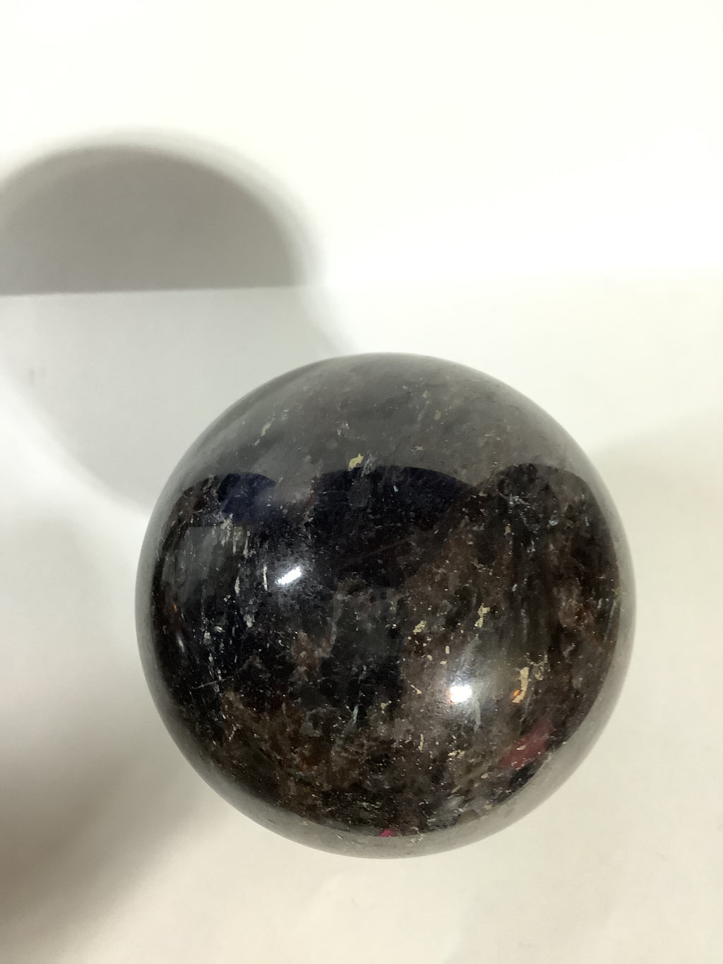 Astrophyllite and Garnet Sphere - Fireworks Stone with Blue and Silver Flashes