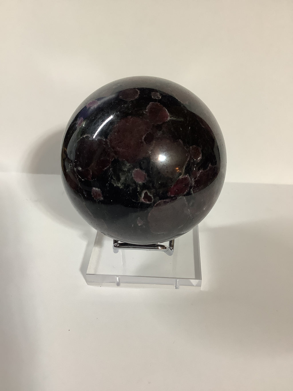 Astrophyllite and Garnet Sphere with Large Garnets