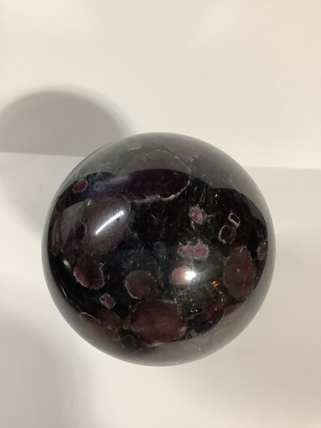 Astrophyllite and Garnet Sphere with Large Garnets