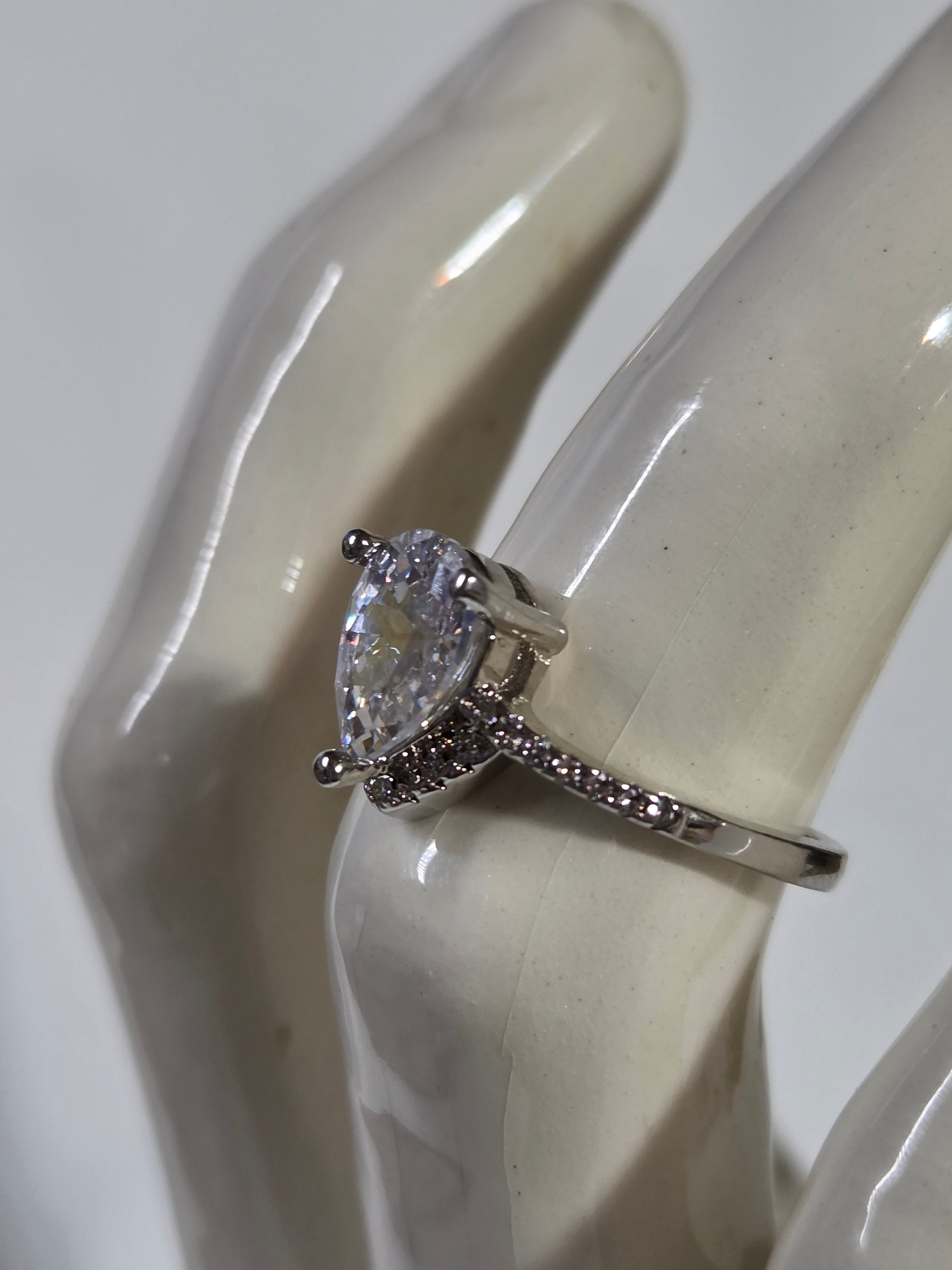 Clear Pear-Cut CZ Solitaire Halo Ring – Specimen 10 | Size 7 | Silver-Tone Costume Jewelry